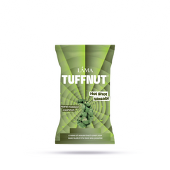 A green packet of TuffNut Hot Shot Wasabi Cashews, known for their bold flavor, is displayed. The packaging highlights wasabi-coated cashews and branding text. This premium snack bag stands upright on a neutral background.