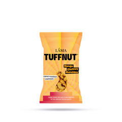 An orange packet of TuffNut Mango Chutney Munchies Cashews displays a window revealing roasted cashews. The packaging highlights hand roasted cashews with an irresistible exotic mango chutney flavor.