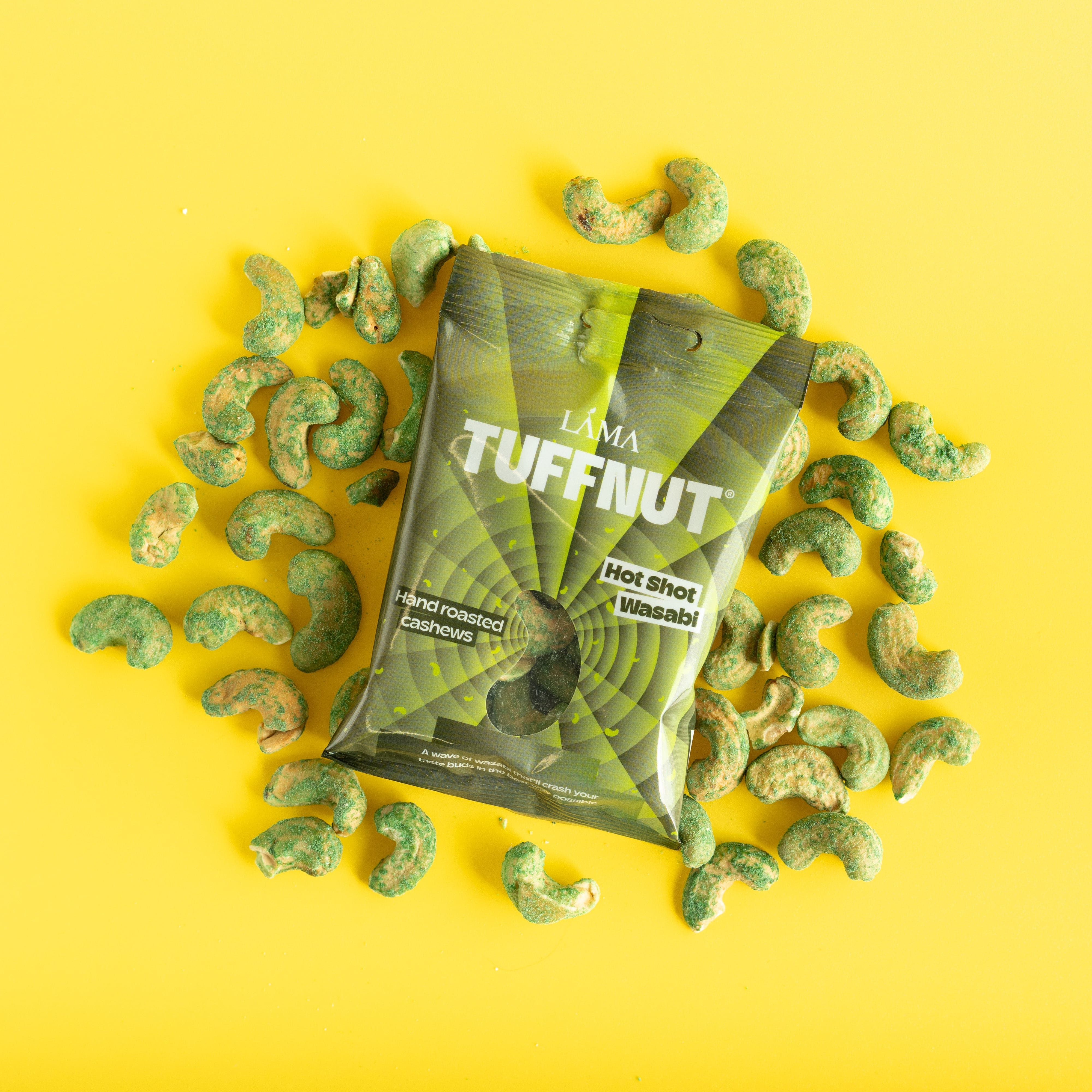 Lama Tuffnut hot shot wasabi cashews on a yellow background